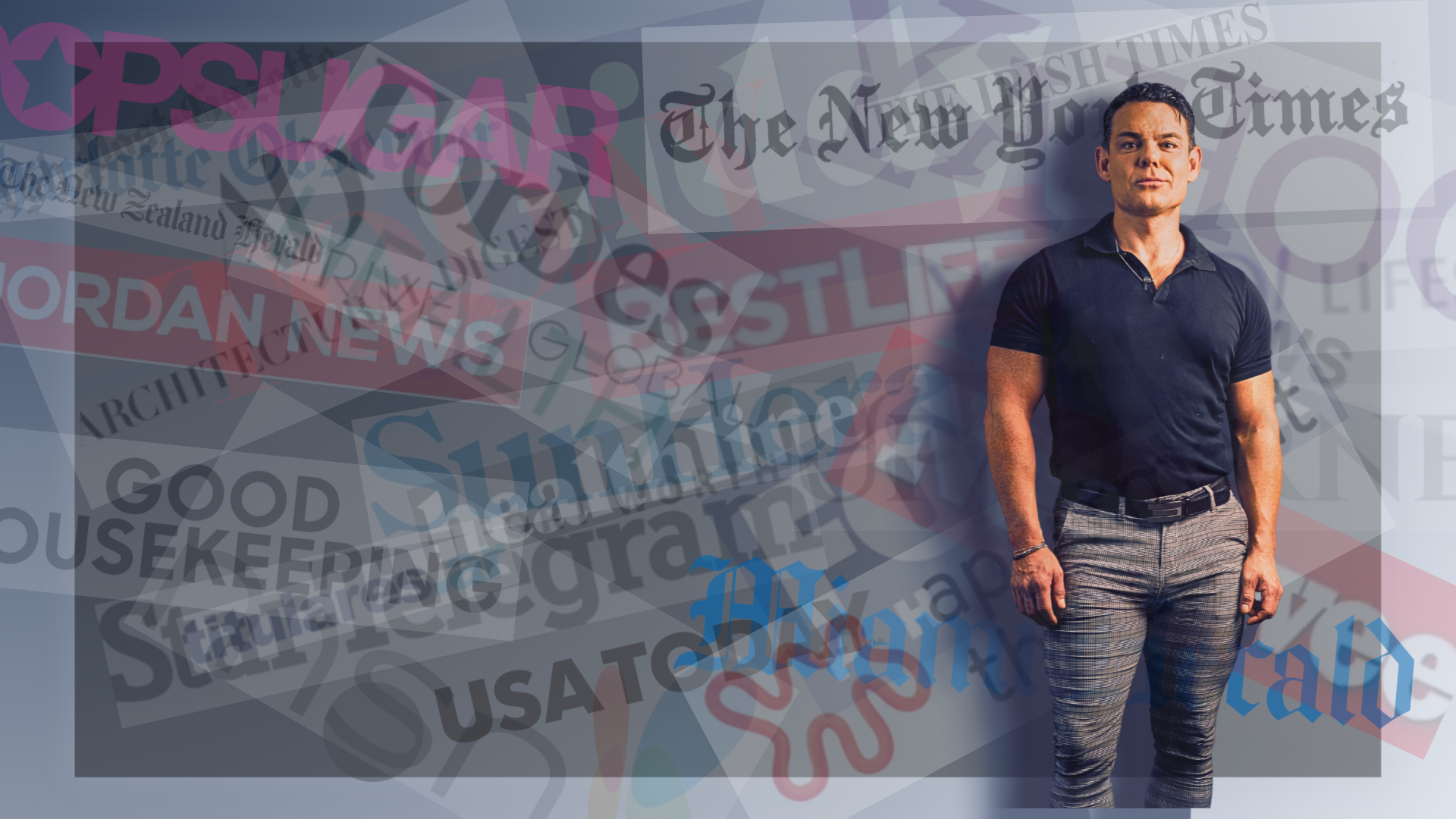 James is standing in front of a wall that has publicaiton names in a collage format